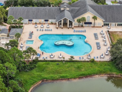 Located in the vibrant, guard-gated 55+ Tampa Bay Golf and on Tampa Bay Golf and Country Club in Florida - for sale on GolfHomes.com, golf home, golf lot