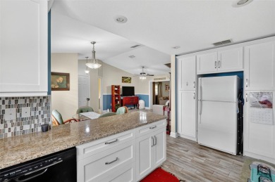 Located in the vibrant, guard-gated 55+ Tampa Bay Golf and on Tampa Bay Golf and Country Club in Florida - for sale on GolfHomes.com, golf home, golf lot