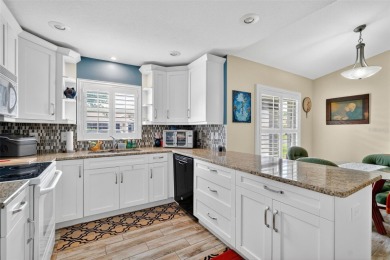Located in the vibrant, guard-gated 55+ Tampa Bay Golf and on Tampa Bay Golf and Country Club in Florida - for sale on GolfHomes.com, golf home, golf lot