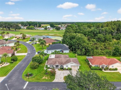 Located in the vibrant, guard-gated 55+ Tampa Bay Golf and on Tampa Bay Golf and Country Club in Florida - for sale on GolfHomes.com, golf home, golf lot