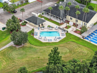 Located in the vibrant, guard-gated 55+ Tampa Bay Golf and on Tampa Bay Golf and Country Club in Florida - for sale on GolfHomes.com, golf home, golf lot