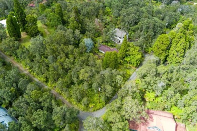 Tucked away in Volcano Village, this property is quiet, serene on Volcano Golf and Country Club in Hawaii - for sale on GolfHomes.com, golf home, golf lot