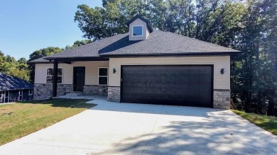 Beautiful New Custom Home in Bella Vista! Situated on a .33-acre on Bella Vista - Metfield Golf Complex and Country Club in Arkansas - for sale on GolfHomes.com, golf home, golf lot