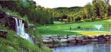 High cliff valley-views overlook the magnificent 18-hole on Ledgestone Country Club and Golf Course in Missouri - for sale on GolfHomes.com, golf home, golf lot