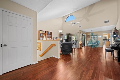 Experience tranquil waterfront living with elevated views in the on Jonathans Landing Golf Club in Florida - for sale on GolfHomes.com, golf home, golf lot