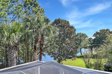 Beautiful custom home overlooking the lake in exclusive gated on Regatta Bay Golf and Country Club in Florida - for sale on GolfHomes.com, golf home, golf lot