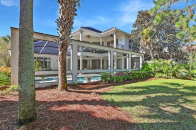Beautiful custom home overlooking the lake in exclusive gated on Regatta Bay Golf and Country Club in Florida - for sale on GolfHomes.com, golf home, golf lot