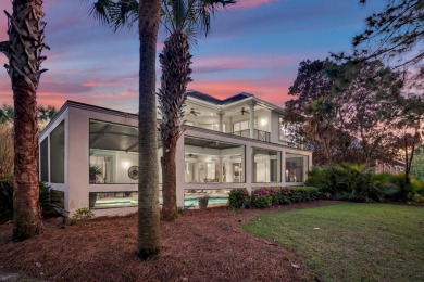 Beautiful custom home overlooking the lake in exclusive gated on Regatta Bay Golf and Country Club in Florida - for sale on GolfHomes.com, golf home, golf lot