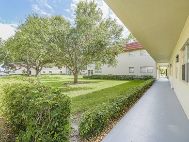 Move-in ready FIRST FLOOR 1BR/1.5BA in the desirable Vista on The American Golf Club in Florida - for sale on GolfHomes.com, golf home, golf lot