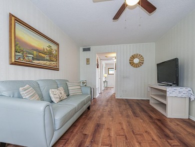 Move-in ready FIRST FLOOR 1BR/1.5BA in the desirable Vista on The American Golf Club in Florida - for sale on GolfHomes.com, golf home, golf lot