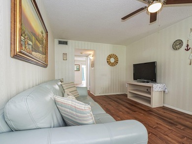 Move-in ready FIRST FLOOR 1BR/1.5BA in the desirable Vista on The American Golf Club in Florida - for sale on GolfHomes.com, golf home, golf lot