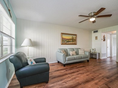 Move-in ready FIRST FLOOR 1BR/1.5BA in the desirable Vista on The American Golf Club in Florida - for sale on GolfHomes.com, golf home, golf lot