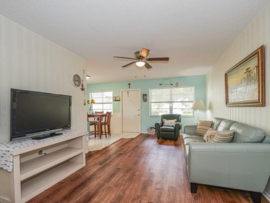 Move-in ready FIRST FLOOR 1BR/1.5BA in the desirable Vista on The American Golf Club in Florida - for sale on GolfHomes.com, golf home, golf lot