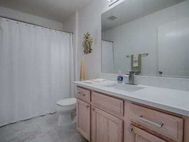 Welcome to this beautifully maintained 3-bedroom, 2-bathroom on Glenview Championship Golf and Country Club in Florida - for sale on GolfHomes.com, golf home, golf lot