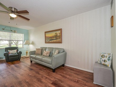 Move-in ready FIRST FLOOR 1BR/1.5BA in the desirable Vista on The American Golf Club in Florida - for sale on GolfHomes.com, golf home, golf lot