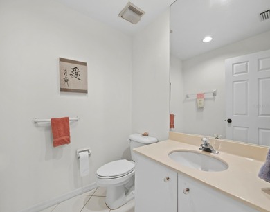 Positioned along the par-5 fairway with tranquil lake views on Longboat Key Golf Club Resort in Florida - for sale on GolfHomes.com, golf home, golf lot