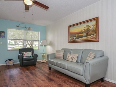 Move-in ready FIRST FLOOR 1BR/1.5BA in the desirable Vista on The American Golf Club in Florida - for sale on GolfHomes.com, golf home, golf lot