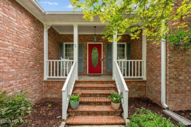 Step into this beautifully updated brick home tucked away in a on Harbour Point Golf Club in North Carolina - for sale on GolfHomes.com, golf home, golf lot