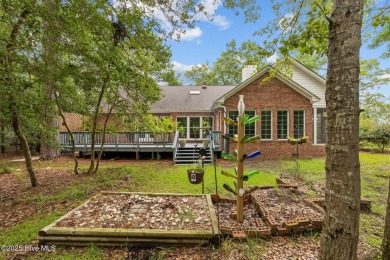 Step into this beautifully updated brick home tucked away in a on Harbour Point Golf Club in North Carolina - for sale on GolfHomes.com, golf home, golf lot
