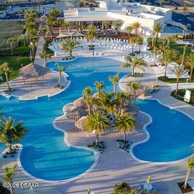 Highly sought-after Nevis Villa in Latitude Margaritaville! This on LPGA International Golf Course in Florida - for sale on GolfHomes.com, golf home, golf lot