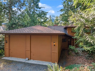 Nestled among the trees on a quiet cul-de-sac that overlooks the on The Resort at the Mountain in Oregon - for sale on GolfHomes.com, golf home, golf lot
