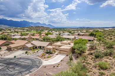 Tucked into a quiet cul-de-sac on an elevated lot, this on Saddlebrooke Golf Course in Arizona - for sale on GolfHomes.com, golf home, golf lot
