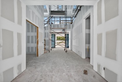 Experience the height of elegance and sophistication in this on Jonathans Landing Golf Club in Florida - for sale on GolfHomes.com, golf home, golf lot