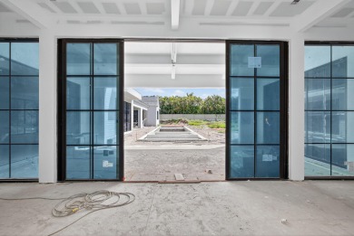 Experience the height of elegance and sophistication in this on Jonathans Landing Golf Club in Florida - for sale on GolfHomes.com, golf home, golf lot