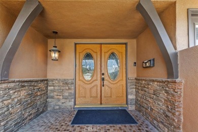 This inviting 4-bedroom home offers flexibility with the on Cresta Verde Golf Club in California - for sale on GolfHomes.com, golf home, golf lot