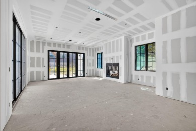 Experience the height of elegance and sophistication in this on Jonathans Landing Golf Club in Florida - for sale on GolfHomes.com, golf home, golf lot