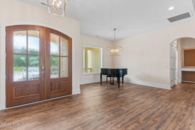 Brand-new and never lived in, this custom-built home in on Cape Fear National At Brunswick Forest in North Carolina - for sale on GolfHomes.com, golf home, golf lot