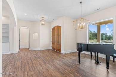 Brand-new and never lived in, this custom-built home in on Cape Fear National At Brunswick Forest in North Carolina - for sale on GolfHomes.com, golf home, golf lot