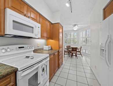 Bathed in natural light, this 2BR, 2.5BA townhome in Fairway Bay on Longboat Key Golf Club Resort in Florida - for sale on GolfHomes.com, golf home, golf lot