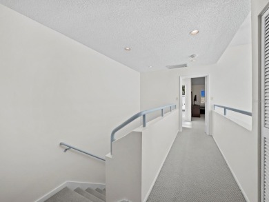 Bathed in natural light, this 2BR, 2.5BA townhome in Fairway Bay on Longboat Key Golf Club Resort in Florida - for sale on GolfHomes.com, golf home, golf lot