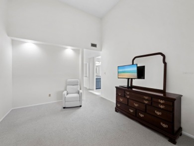 Bathed in natural light, this 2BR, 2.5BA townhome in Fairway Bay on Longboat Key Golf Club Resort in Florida - for sale on GolfHomes.com, golf home, golf lot