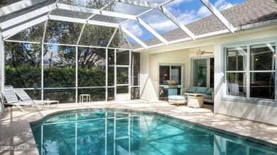 Welcome to your private Florida retreat! This spacious 4-bedroom on Plantation Bay Golf and Country Club in Florida - for sale on GolfHomes.com, golf home, golf lot