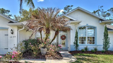 Welcome to your private Florida retreat! This spacious 4-bedroom on Plantation Bay Golf and Country Club in Florida - for sale on GolfHomes.com, golf home, golf lot