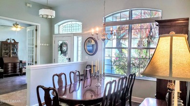 Welcome to your private Florida retreat! This spacious 4-bedroom on Plantation Bay Golf and Country Club in Florida - for sale on GolfHomes.com, golf home, golf lot