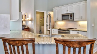 Welcome to your private Florida retreat! This spacious 4-bedroom on Plantation Bay Golf and Country Club in Florida - for sale on GolfHomes.com, golf home, golf lot