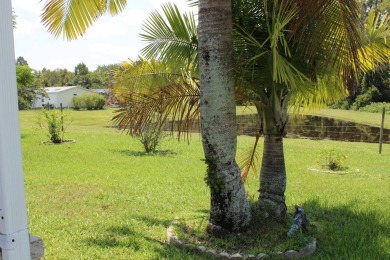 Charming Turn-Key 3-Bedroom Home with All Seasons Room and Pond on Schalamar Creek Golf and Country Club in Florida - for sale on GolfHomes.com, golf home, golf lot