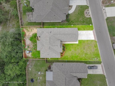 Located on the golf course is this awesome like-new brick home on Shadow Ridge Golf Club in Mississippi - for sale on GolfHomes.com, golf home, golf lot