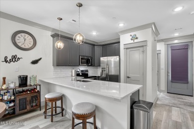 Rare opportunity to own a ground-level, three years young condo on Diamondhead Country Club in Mississippi - for sale on GolfHomes.com, golf home, golf lot