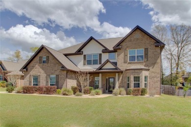 This immaculate spacious 6 bedrooms 3.5 baths with a large media on Magnolia Grove Golf Club in Alabama - for sale on GolfHomes.com, golf home, golf lot