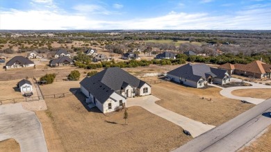 Custom built home in prestigious Rolling Creek Ranch. This on De Cordova Bend Country Club in Texas - for sale on GolfHomes.com, golf home, golf lot