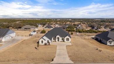 Custom built home in prestigious Rolling Creek Ranch. This on De Cordova Bend Country Club in Texas - for sale on GolfHomes.com, golf home, golf lot