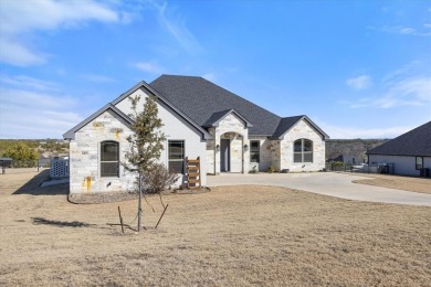 Custom built home in prestigious Rolling Creek Ranch. This on De Cordova Bend Country Club in Texas - for sale on GolfHomes.com, golf home, golf lot