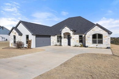 Custom built home in prestigious Rolling Creek Ranch. This on De Cordova Bend Country Club in Texas - for sale on GolfHomes.com, golf home, golf lot