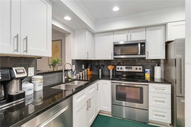 Enjoy peaceful unobstructed views of the lake and golf course on Palm Aire Country Club of Sarasota in Florida - for sale on GolfHomes.com, golf home, golf lot