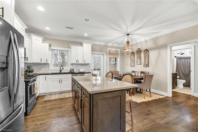 Discover the charm of this custom-built Craftsman home at Mt on Mountain Aire Golf Course in North Carolina - for sale on GolfHomes.com, golf home, golf lot