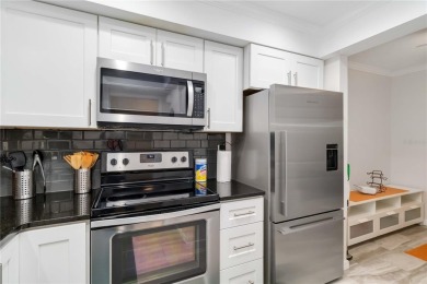 Enjoy peaceful unobstructed views of the lake and golf course on Palm Aire Country Club of Sarasota in Florida - for sale on GolfHomes.com, golf home, golf lot